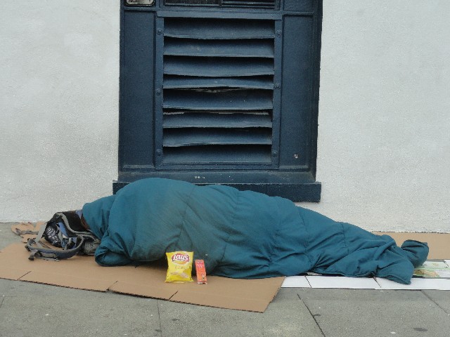 Potato chips and peanut butter cheese crackers for sleeping homeless person