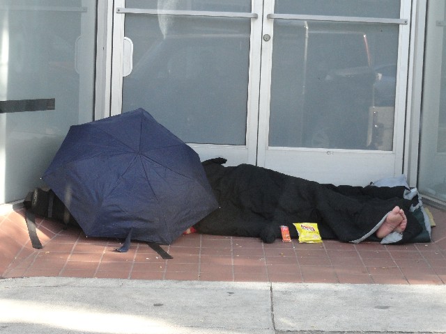 The Little Way Homeless Outreach delivers chips and peanut butter cheese crackers to homeless person sleeping